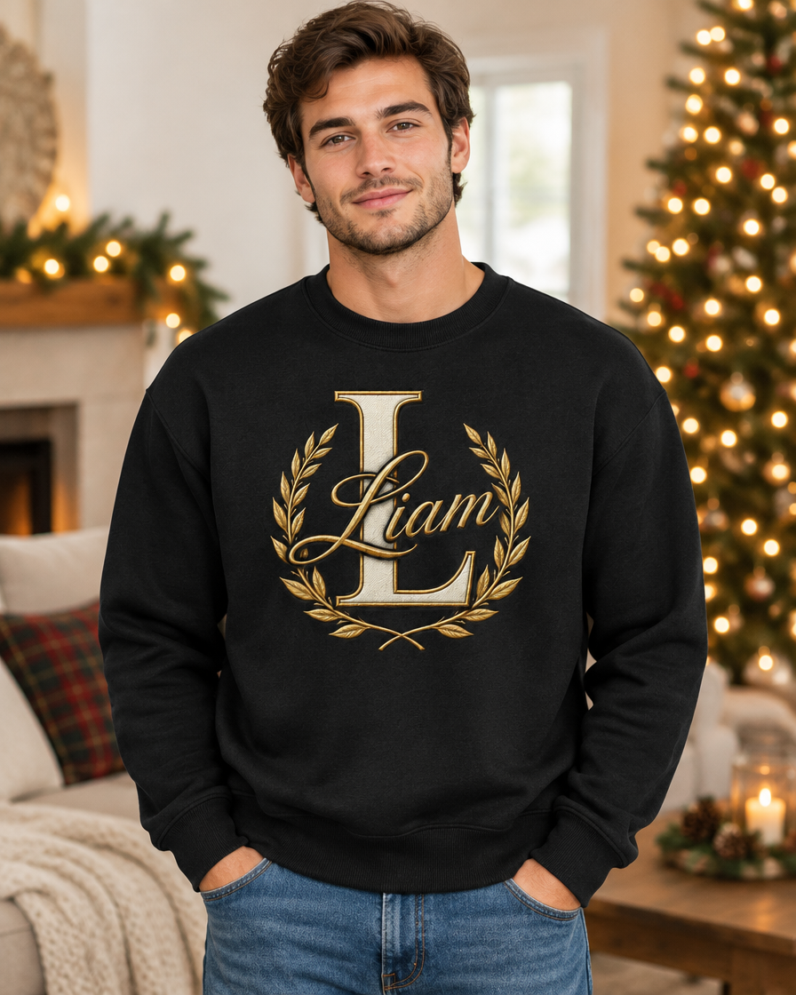 Black personalized crewneck on a model, example name Liam
